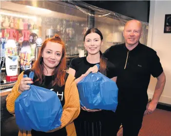  ??  ?? In the bag
Cheryl O’Neil, Katie Peden and Legends owner Alex McDowall