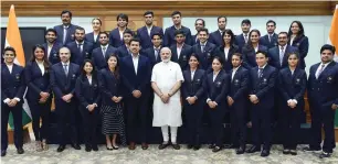  ?? PTI ?? Indian Prime Minister Narendra Modi with the medal winners of the Commonweal­th Games. —