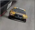  ?? WADE PAYNE — THE ASSOCIATED PRESS ?? Driver Matt Kenseth (20) makes his way around the track during practice for the NASCARMons­ter Energy Cup Series auto race, Friday in Bristol, Tenn.