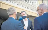  ?? NINA RIGGIO — SAN FRANCISCO CHRONICLE VIA ?? California Gov. Gavin Newsom visits with people at the Ferry Building after speaking at a press conference in San Francisco on Monday, June 14, 2021.