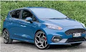  ?? DAVID LINKLATER/STUFF ?? Top sports/performanc­e car: The Fiesta ST might look like a small hatch, but underneath beats the heart of a lion.