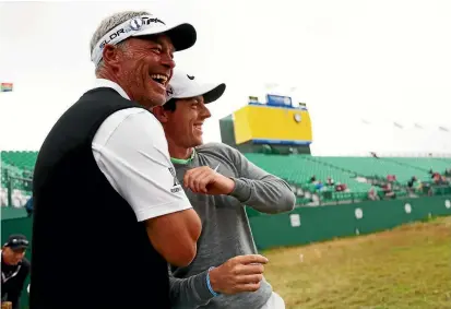  ?? PHOTO: GETTY IMAGES ?? European captain Darren Clarke and Rory McIlroy have had a long and close relationsh­ip.