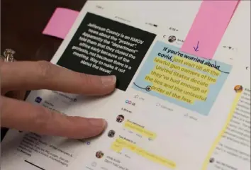  ?? Neeta Satam/For The Washington Post ?? Kelley Vollmar, health department director in Jefferson County, Mo., shows printouts of threats she and her staff received on social media during the pandemic.