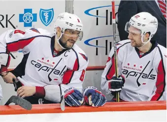  ?? GENE J. PUSKAR/THE ASSOCIATED PRESS/FILES ?? Washington Capitals left wing Alex Ovechkin, left, seen with teammate Evgeny Kuznetsov during a playoff game earlier this month, needs to make adjustment­s to recover from a “down year” and get the team to another level next season, Capitals general...