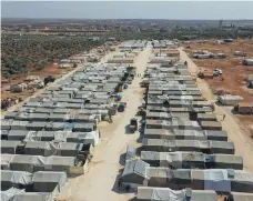  ?? AFP ?? A camp for internally displaced people in Idlib province. More than 13 million Syrians have been displaced in 10 years