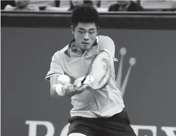  ??  ?? Wu Yibing yesterday during his first round Shanghai Masters tournament clash, in the Qizhong Tennis Center, against Chinese compatriot Li Zhe. — Dong Jun