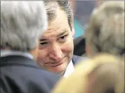  ?? ORLINWAGNE­R / ASSOCIATED PRESS ?? Sen. Ted Cruz, R-Texas, listens to supporters at a caucus site Saturday inWichita, Kan. Cruz defeated businessma­n Donald Trump in the caucus.