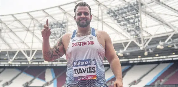  ?? VICTORIA JONES ?? Bridgend’s Aled Davies celebrates after winning the Men’s Discus F42 final during day three of the 2017 World Para Athletics Championsh­ips at London Stadium