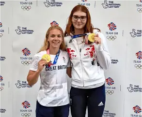  ?? PICTURE: Karl Bridgeman/getty Images for The National Lottery ?? Freya Anderson (right) with Anna Hopkin and their Tokyo 2020 Olympic medals