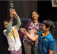  ?? Arkansas Democrat-Gazette file photo ?? Last year’s Arkansas State Spelling Bee winner, Pavani Chittemset­ty, celebrates after correctly spelling “brigadier” to clinch the win.