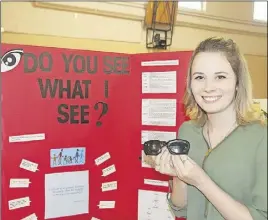  ?? LyNN CurwiN/Truro Daily News ?? Ashlee Bonnell, a first year social services student at the Truro campus of the NSCC, researched a variety of disabiliti­es for her project. Student projects were on display at the college recently for the Applied Services Learning Café.