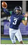  ?? Special to the Democrat-Gazette/ JIMMY JONES ?? Little Rock Christian quarterbac­k Justice Hill throws a pass during the Warriors’ 87-63 victory over the Maumelle Hornets on Friday. Hill passed for 120 yards and 2 touchdowns while rushing for 107 yards and 2 more touchdowns.