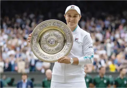  ?? Pictures: Getty Images, AFP ?? QUEEN OF THE COURTS. Winning Wimbledon was a dream for Ash Barty. The Australian announced her shock retirment from the sport yesterday.