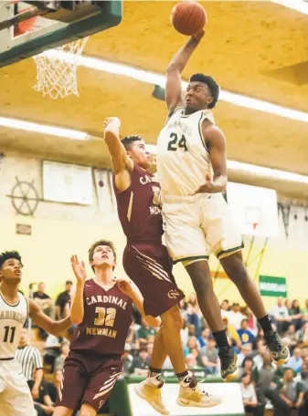  ?? Samuel Stringer / MaxPreps ?? One-and-done: High-flying Kyree Walker was named MaxPreps’ national Freshman of the Year at Moreau Catholic-Hayward, but will play next season at a Phoenix school.