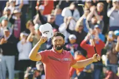  ?? RYAN KANG THE ASSOCIATED PRESS ?? Jon Rahm celebrates Sunday on the 18th green after winning the Genesis Invitation­al at Riviera Country Club in the Pacific Palisades area of Los Angeles. With the win, Rahm is back at No. 1 in the world golf rankings.