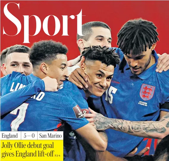  ??  ?? Ollie Watkins (centre) is mobbed by his team-mates, including Jesse Lingard (left) and Tyrone Mings, after the Aston Villa striker scored on his England debut at Wembley last night