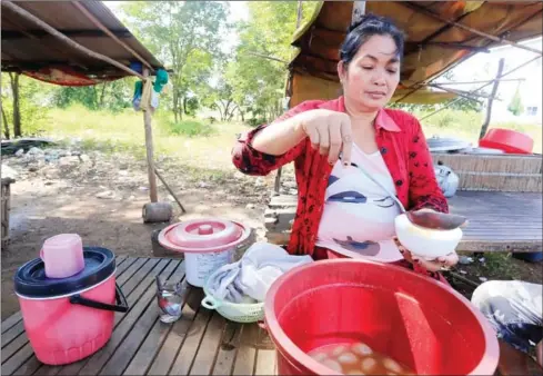  ?? HENG CHIVOAN ?? Chea Sreypov, who makes a living selling cakes in Kampong Cham province, believes Kem Sokha’s alleged affair is not of national importance.