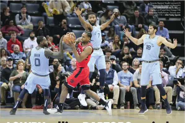  ?? — USA Today Sports ?? Toronto Raptors’ Kawhi Leonard (2) drives to the basket as Memphis Grizzlies’ Jamychal Green (0), Wayne Selden Jr (7) and Omri Casspi (18) defend at Fedexforum. Toronto won 122-114.