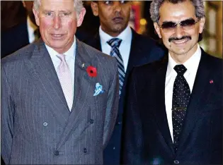  ?? ?? INVESTIGAT­IONS: Charles meeting Saudi prince Al Waleed bin Talal al Saud