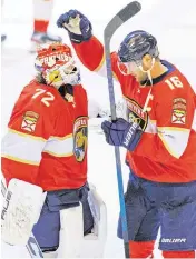  ?? DAVID SANTIAGO dsantiago@miamiheral­d.com ?? Panthers goaltender Sergei Bobrovsky and Panthers center Aleksander Barkov celebrate a win over the Ducks. Barkov makes Greg’s Cote’s list of Top 20 sports stars.