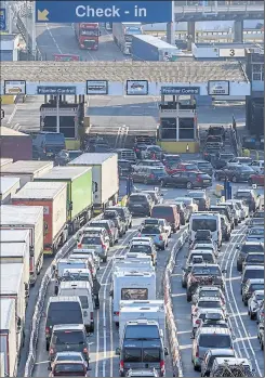  ?? Stuart Brock Photograph­y ?? Traffic begins to flow through Dover, but queues are expected to grow again over the long weekend