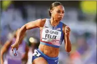  ?? Hannah Peters / Getty Images for World Athletics ?? Allyson Felix competes in the women’s 4x400 relay at the World Athletics Championsh­ips in Oregon July 23.