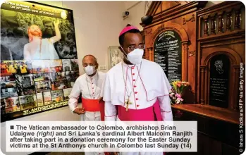  ?? ?? ■ The Vatican ambass dor to olomb , archbishop an Udaigwe (right) and ri ka’s dinal Albert Malcolm jith after taking part in on ion ceremo for he Easte Sunday victims at the Anthonys hurc in bo Su (14)