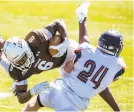  ?? GAMIZ/THE MORNING CALL APRIL ?? Lehigh University’s Zaythan Hill (6) runs the football against Bucknell University’s Gerrit Van Itallie (24) on Saturday.