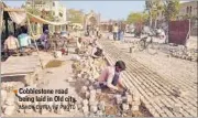  ?? ASHOK DUTTA/HT PHOTO ?? Cobbleston­e road being laid in Old city.