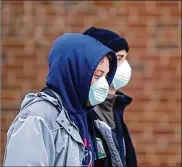  ?? STAFF FILE ?? Miami University students wear masks at the main campus in Oxford on Jan. 28, 2020.