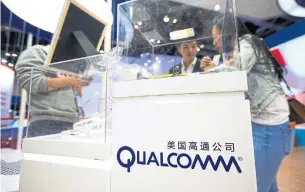  ?? MARK SCHIEFELBE­IN/THE ASSOCIATED PRESS FILE PHOTO ?? Walking away from its acquisitio­n deal would cost Qualcomm $2 billion (U.S.) in terminatio­n fees, as well as the company’s biggest attempt yet to diversify its business.