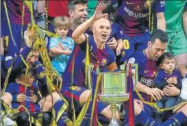  ?? REUTERS ?? Andres Iniesta (centre) was understand­ably tearful after Barcelona’s King’s Cup win.