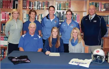  ??  ?? Bailey Miller (seated, center) has signed on to continue her softball career at nearby Chattanoog­a State. On hand for the ceremony were Dale McDowell and Tiffany Miller, Gordon Lee head coach Dana Mull, Tucker Miller, Chattanoog­a State head coach...