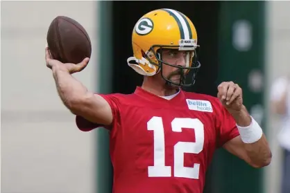  ??  ?? Aaron Rodgers throws during training camp in Green Bay, Wis., in 2020 Photograph: Morry Gash/AP