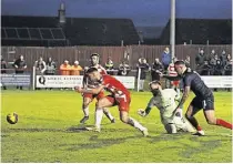  ?? ?? ain’T anDRew’S Day Rose keeper Michael Andrews looks on as the ball rolls into his net from Josh Grigor's own goal