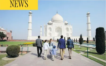  ?? SEAN KILPATRICK / THE CANADIAN PRESS ?? Prime Minister Justin Trudeau, wife Sophie Gregoire Trudeau and their children visit the Taj Mahal in Agra, India, on Sunday. Behind the scenes, efforts were being made to extend an olive branch to Punjab Chief Minister Amarinder Singh.