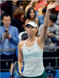  ?? AFP ?? Maria Sharapova of Russia waves to the crowd after her victory over Mihaela Buzarnescu of Romania on Monday. —