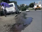  ?? Pictures: BONGANI MBATHA ?? Unrepaired water leaks are a concern for some Durban residents on Foreman Road.