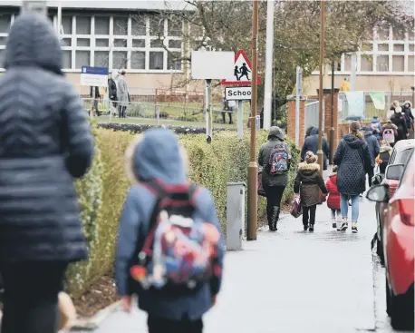  ??  ?? As the city’s children return to schools, a cautious approach is being urged to prevent a spike in Covid rates.