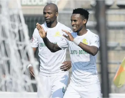  ?? Picture: Gallo Images ?? JOY. Sundowns’ Themba Zwane celebrates after scoring a goal with team-mate Tebogo Langerman during their Absa Premiershi­p match against SuperSport United at Lucas Moripe Stadium yesterday.