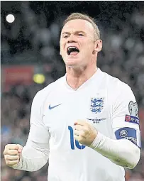  ??  ?? Wayne Rooney reacts after scoring a goal for England in 2015.