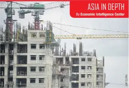  ??  ?? Labourers work on a constructi­on site on the outskirts of Yangon. Plans to build a prosperous Myanmar rest on the outcome of the Nov 8 elections pitting the army-backed ruling party against Aung San Suu Kyi’s National League for Democracy.