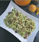  ?? Gretchen McKay/Post-Gazette ?? Brussels sprouts slaw is tossed with a tangy mustard dressing and maple-glazed pecans.