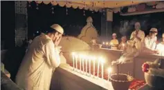  ?? AP ?? ■ Praying at a dargah in Guwahati on Shabebaara­t.