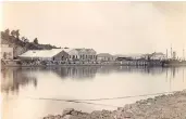  ??  ?? THE TEST OF TIME: Wharf Street in its historical setting, back then already a commercial hub