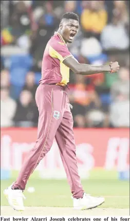  ?? ?? Fast bowler Alzarri Joseph celebrates one of his four wickets against Zimbabwe yesterday.