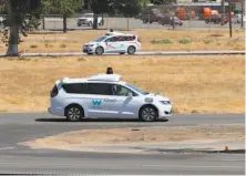  ?? Michael Macor / The Chronicle ?? Waymo’s completely autonomous white minivans are now on pace to move from the test track to Bay Area streets.