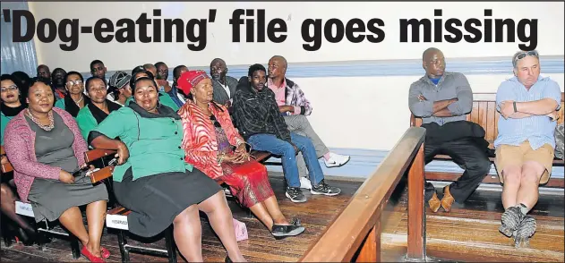  ?? Picture: MICHAEL PINYANA ?? IN THE DOCK: Seated facing the camera are Siza Masentile and Karl Krull, both accused of attempted murder, assault and crime injuria. Against the wall to the left are Lwando Folokwe and Akhona Dyantyi, accused of illegal hunting, at the Komga...