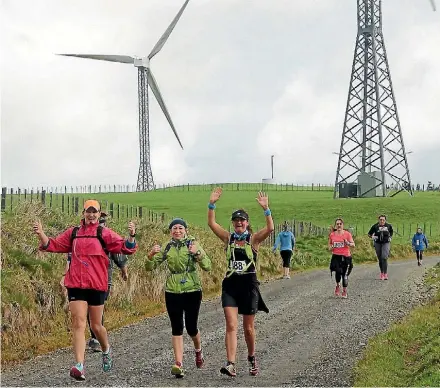  ?? PHOTO: GAVIN TEAHAN/SUPPLIED ?? Participan­ts on the 2016 North Range run among the wind turbines.