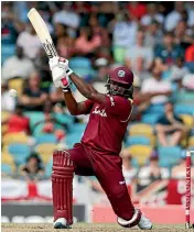  ??  ?? Chris Gayle on the charge.